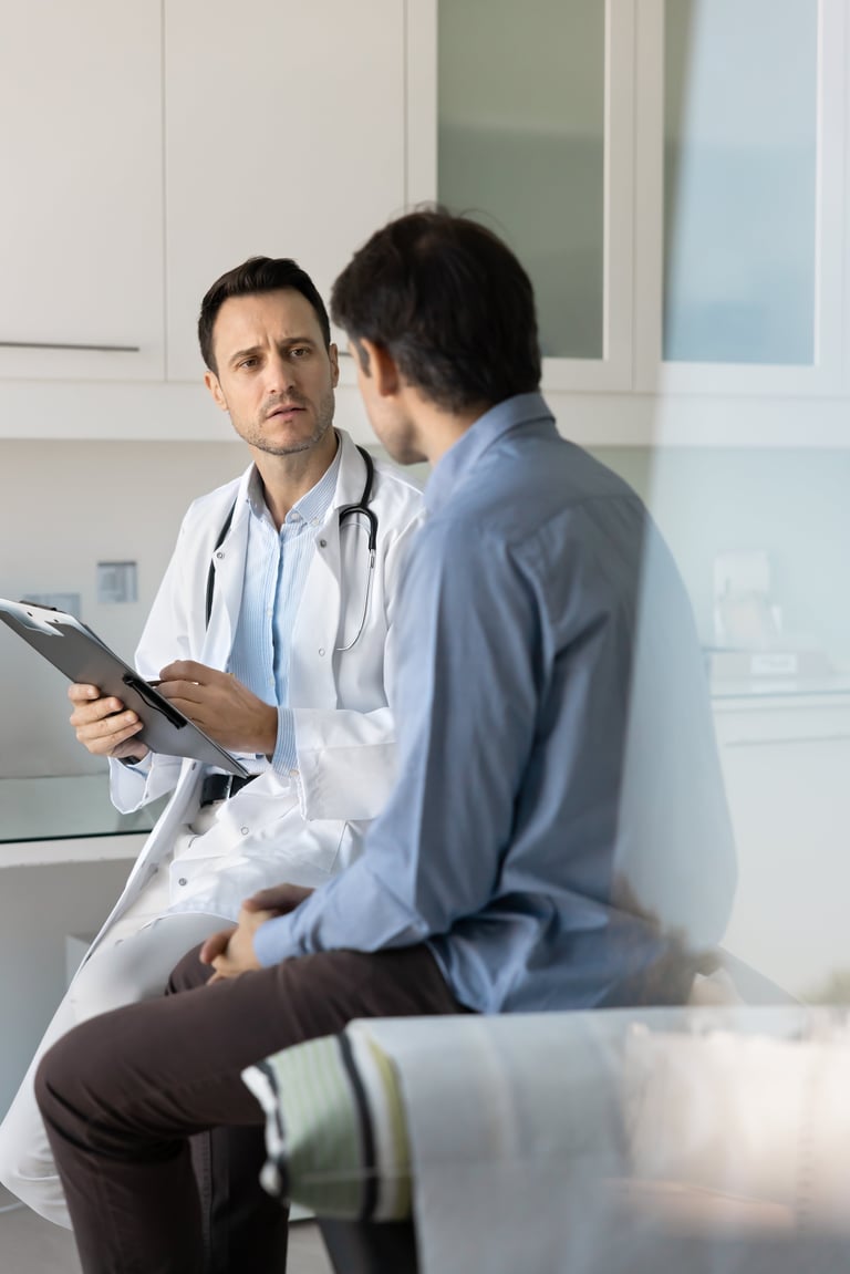 Doctor examining patient in clinic